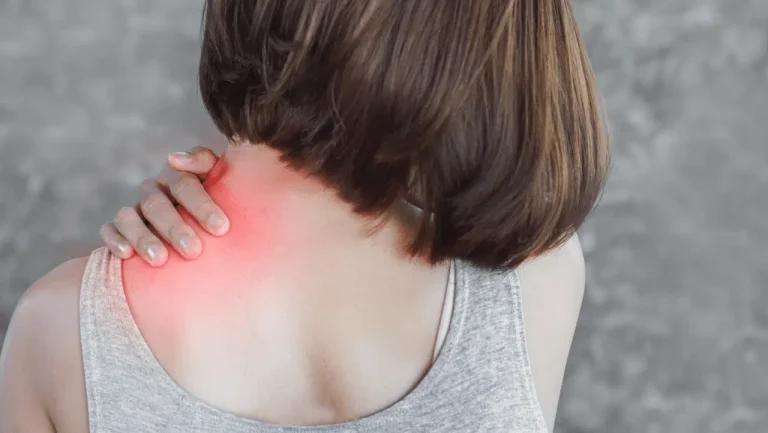 woman pain in left shoulder and neck